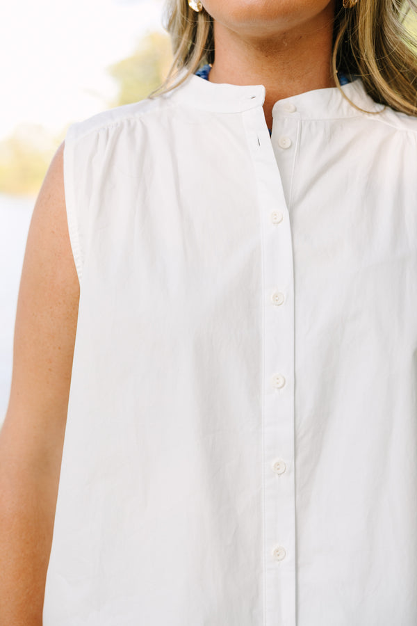 Plus Size white sleeveless button-down tank with a mandarin collar and navy blue shorts.