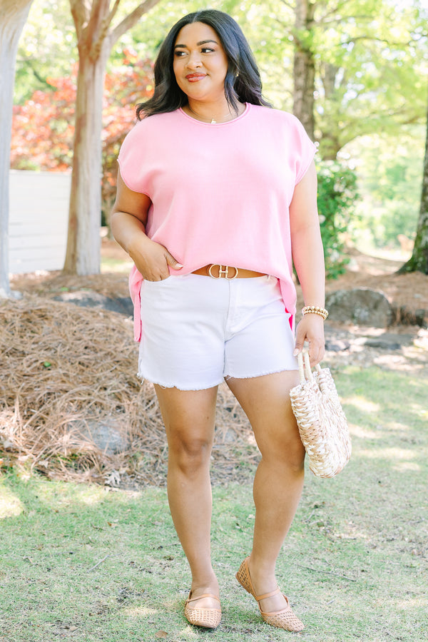 Plus size lightweight pink knit sweater with cap sleeves and a relaxed fit.