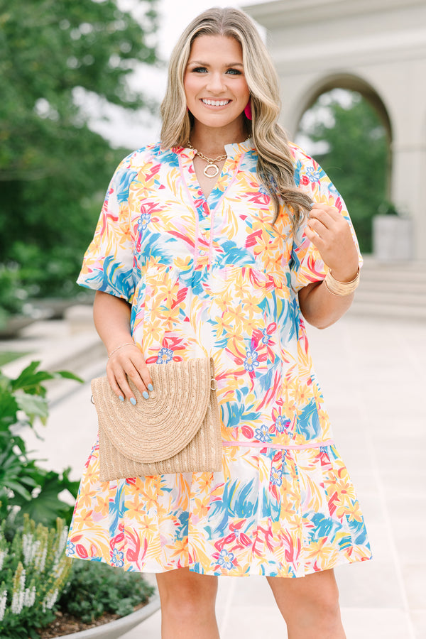 Plus Size yellow floral print cotton dress with a split v-neck, puff sleeves, and ruffled hem.