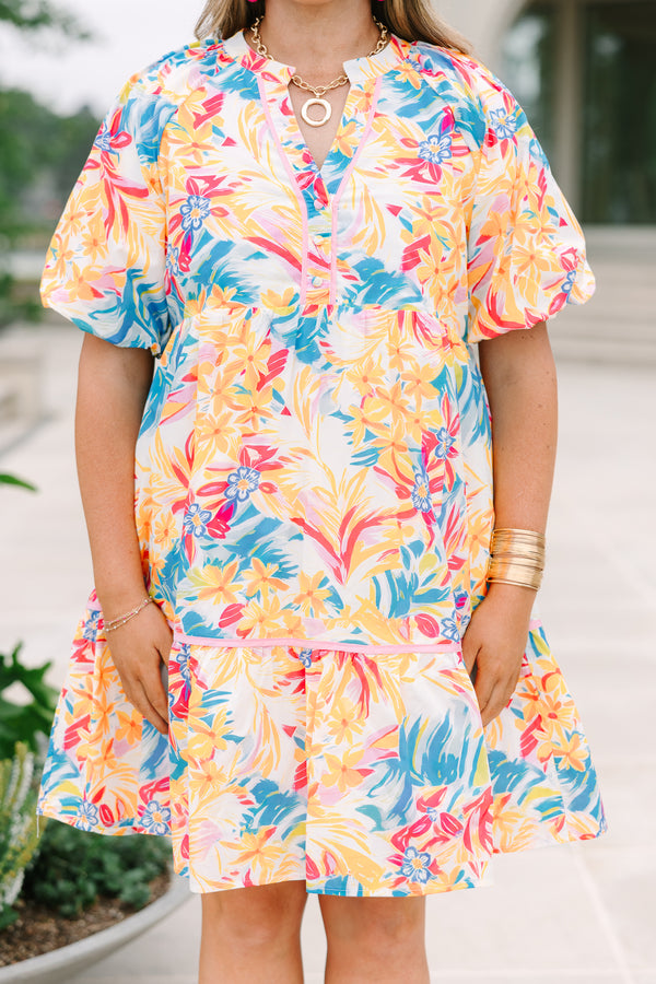 Plus Size yellow floral print cotton dress with a split v-neck, puff sleeves, and ruffled hem.
