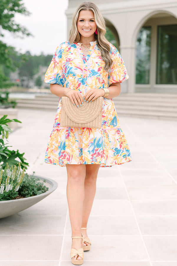 Plus Size yellow floral print cotton dress with a split v-neck, puff sleeves, and ruffled hem.