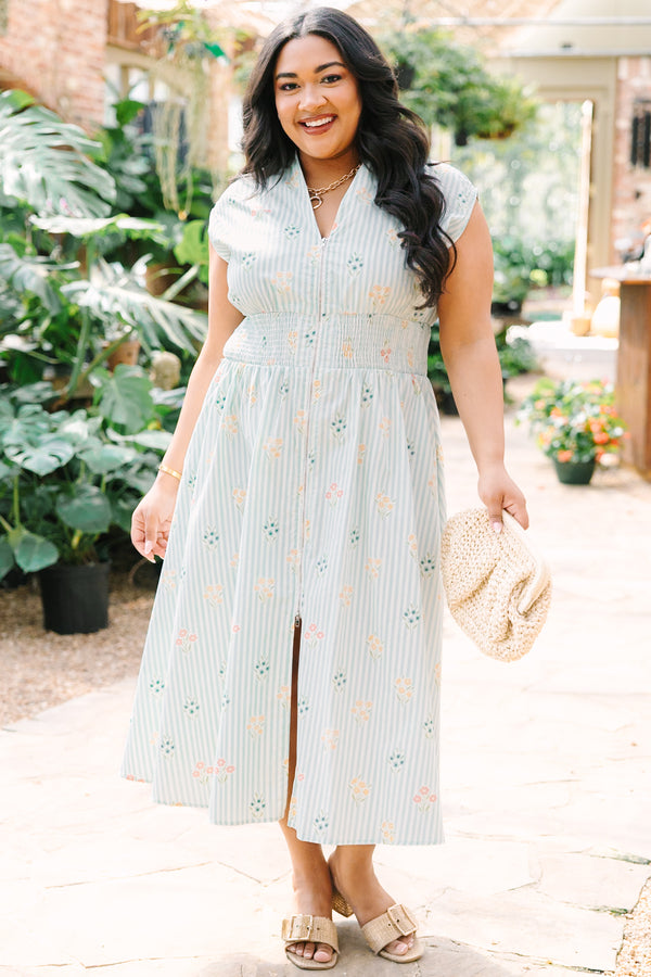 Chic Soul plus size clothing, light blue striped short sleeve maxi dress with with a zipper detail starting at the middle of the chest and going down to the knee as well as cinched stretchy waistband and a floral pattern throughout