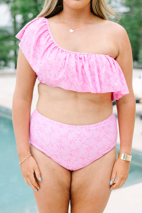Chic Soul Plus Size Clothing, an asymmetrical one sleeve ruffle style swim top in a pink ribbon print