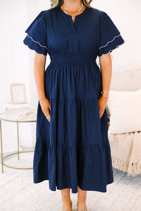Plus Size navy tiered midi dress with scalloped flutter sleeves and a split neckline.