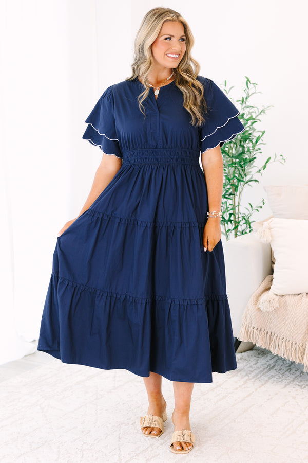 Plus Size navy tiered midi dress with scalloped flutter sleeves and a split neckline.