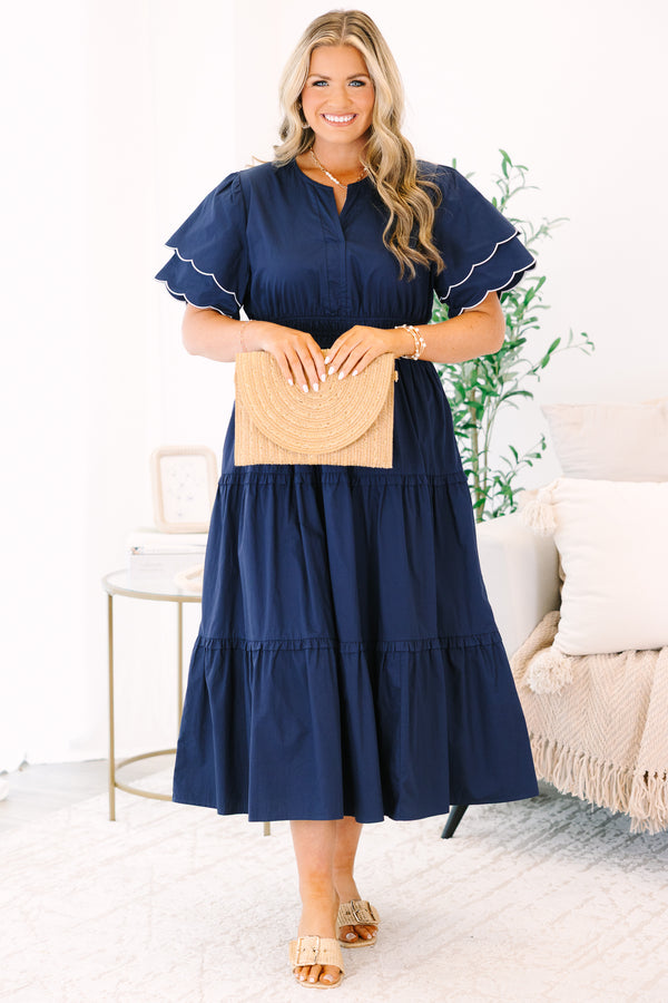 Plus Size navy tiered midi dress with scalloped flutter sleeves and a split neckline.
