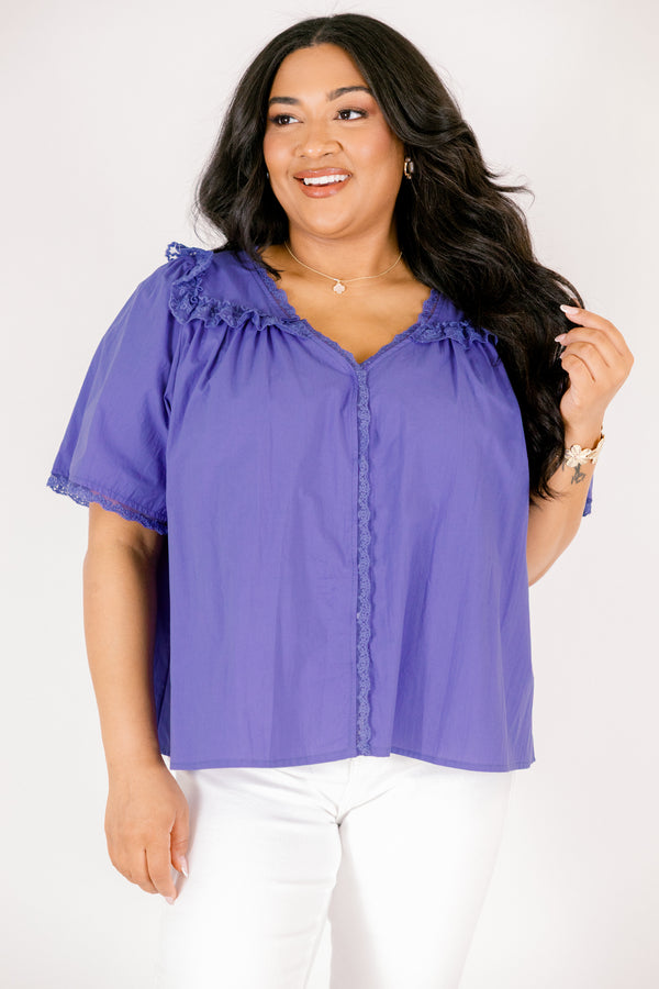 Chic Soul plus size clothing, blue short sleeve top featuring a ruffle bib on the shoulders lace details down the center and lace trim along the ends of each sleeve and the shoulder ruffle