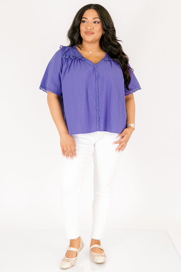 Chic Soul plus size clothing, blue short sleeve top featuring a ruffle bib on the shoulders lace details down the center and lace trim along the ends of each sleeve and the shoulder ruffle