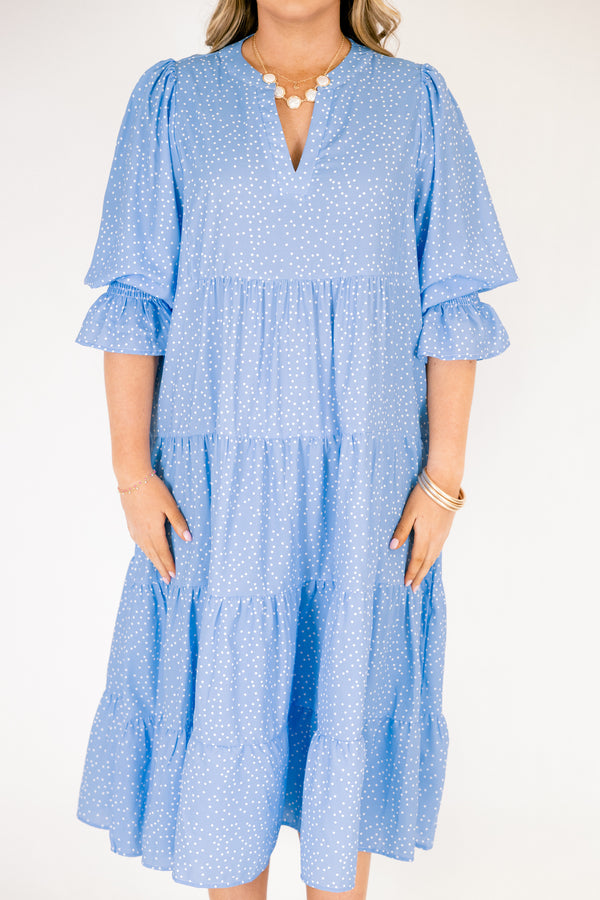 Chic Soul plus size clothing, blue midi sleeve midi dress with cinching at the end of the sleeves, a tiered skirt, and a v-neckline with small white polka dots throughout the dress
