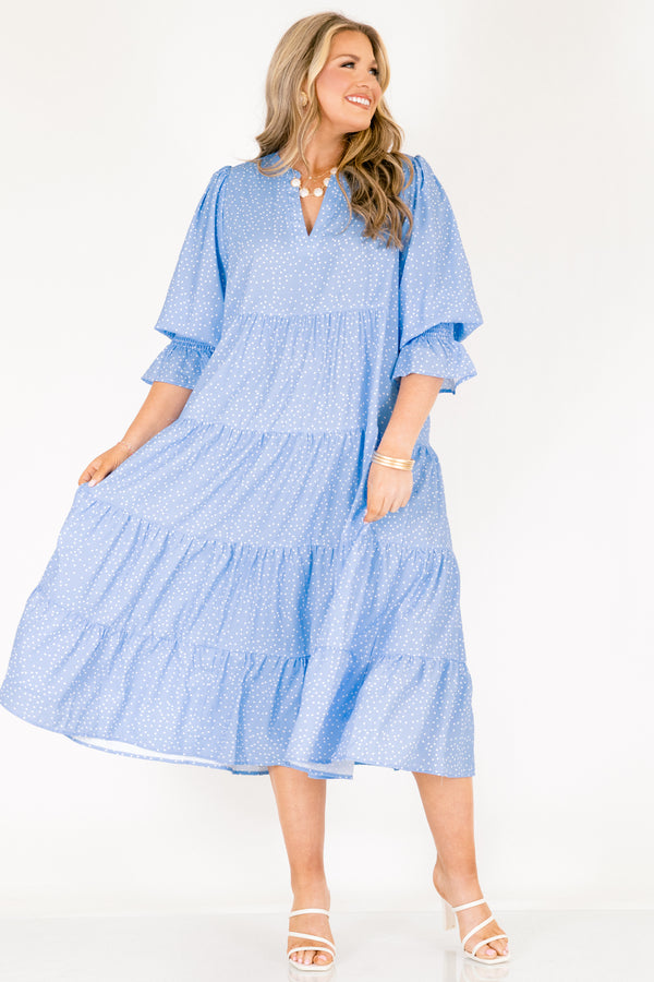 Chic Soul plus size clothing, blue midi sleeve midi dress with cinching at the end of the sleeves, a tiered skirt, and a v-neckline with small white polka dots throughout the dress