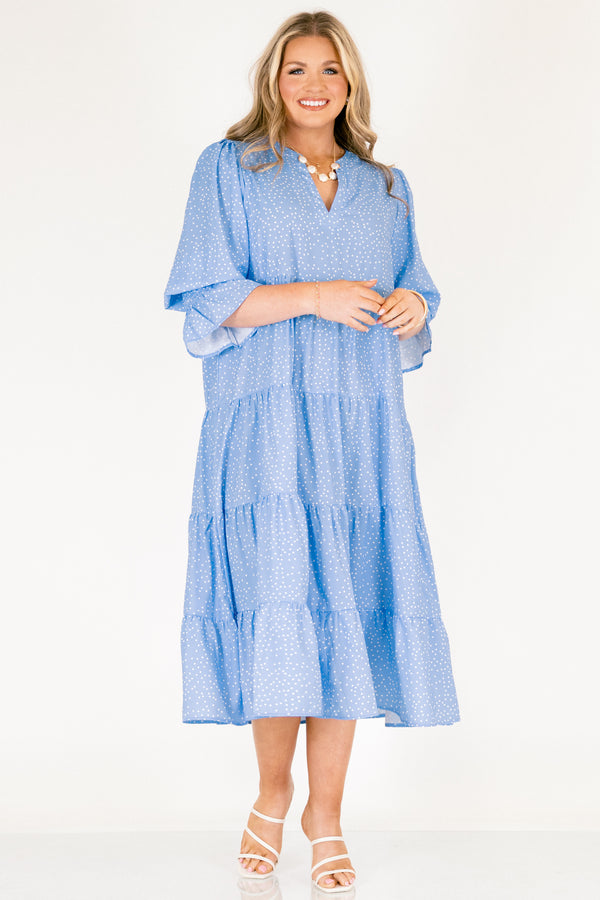 Chic Soul plus size clothing, blue midi sleeve midi dress with cinching at the end of the sleeves, a tiered skirt, and a v-neckline with small white polka dots throughout the dress