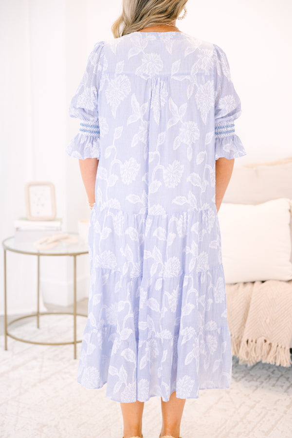 Plus Size blue and white striped tiered midi dress with floral print and puff sleeves.