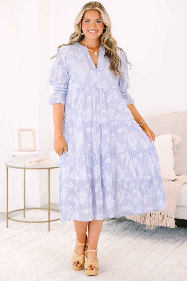 Plus Size blue and white striped tiered midi dress with floral print and puff sleeves.