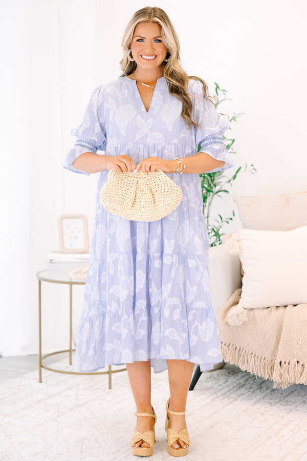 Plus Size blue and white striped tiered midi dress with floral print and puff sleeves.