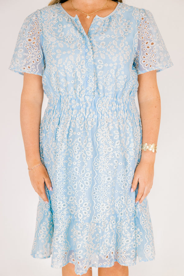 Chic Soul plus size clothing, short-sleeve baby blue ruffle dress with a smocked waistline and a button-down-neckline with an off-white eyelet pattern