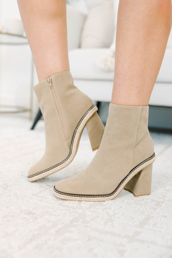Apricot suede booties with a block heel and braided espadrille trim.