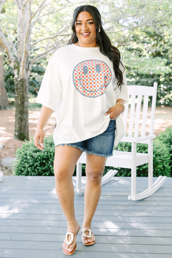 Chic Soul plus size clothing, white short sleeve oversized boyfriend tee with red, white, and blue checkered print smiley face graphic in the middle