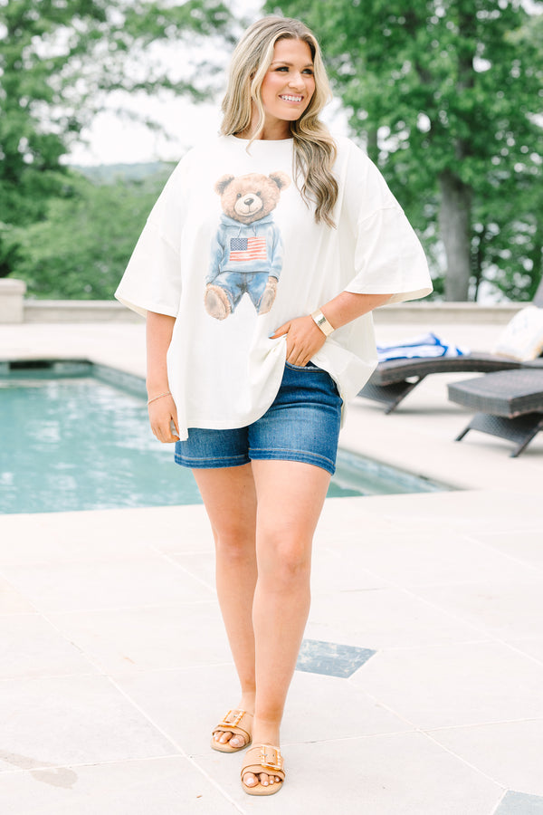 Ivory oversized boyfriend tee featuring a patriotic teddy bear graphic with an American flag.
