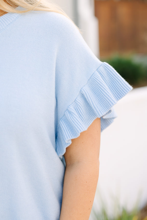 Plus Size light blue short sleeve knit sweater with a crew neck and ruffled sleeves.