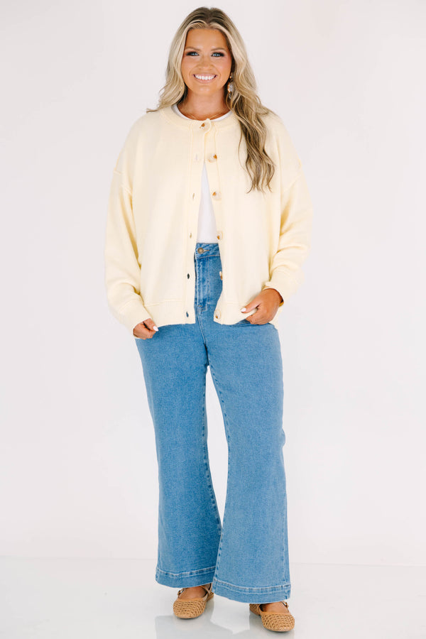 Plus size classic wash wide leg jeans with front patch pockets and a flattering high-waisted fit.