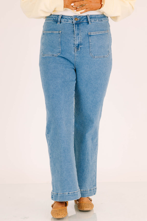 Plus size classic wash wide leg jeans with front patch pockets and a flattering high-waisted fit.