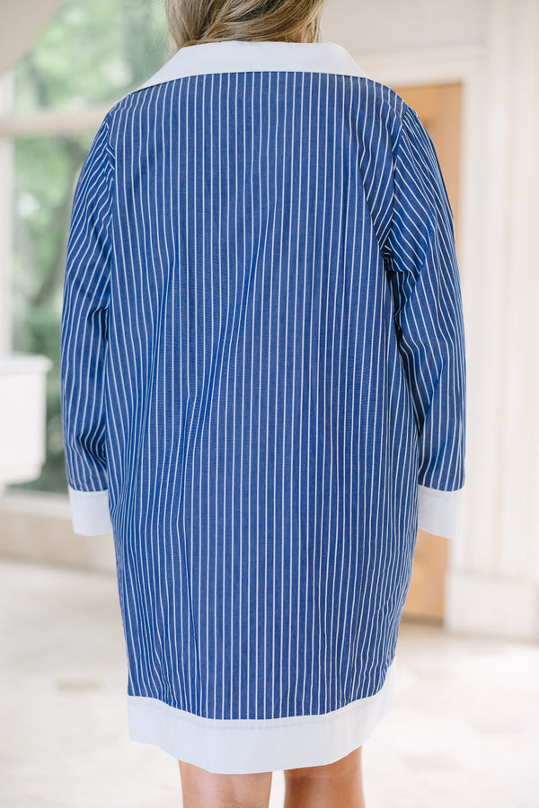 Chic Soul Plus Size Clothing, a short navy and white striped dress with white trims, long sleeves and a collared button up V-neck. 