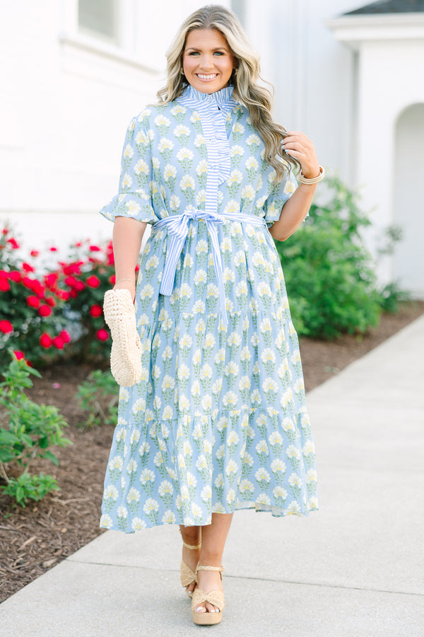 Plus Size blue floral midi dress with a ruffle collar, striped waist tie, and tiered skirt.