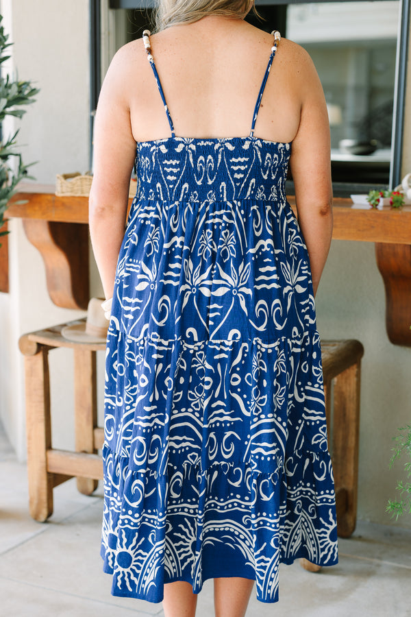 Plus Size cobalt blue midi dress with a white batik-style print, tiered skirt, and thin straps.