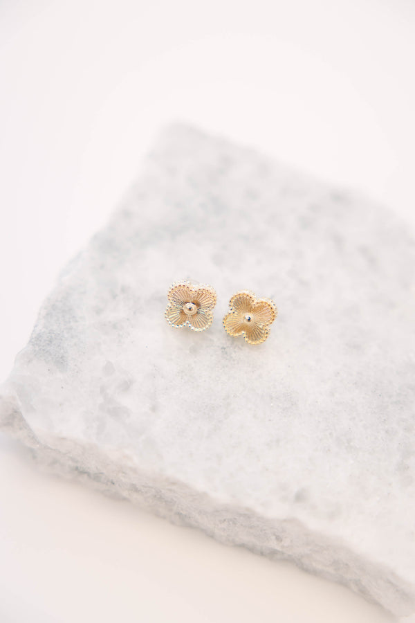 Plus Size Gold four-leaf clover stud earrings with a textured, sunburst finish and beaded edges.