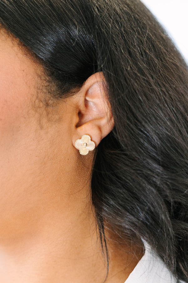 Plus Size Gold four-leaf clover stud earrings with a textured, sunburst finish and beaded edges.