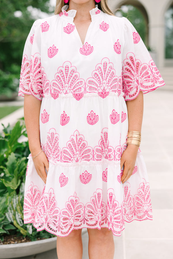 Plus Size white babydoll dress with pink eyelet embroidery, split v-neckline, and tiered skirt.
