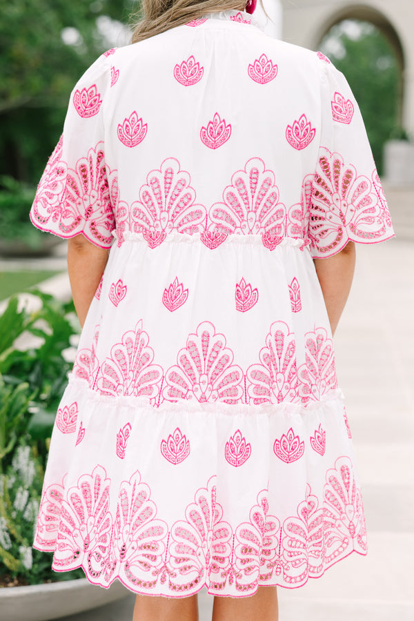 Plus Size white babydoll dress with pink eyelet embroidery, split v-neckline, and tiered skirt.