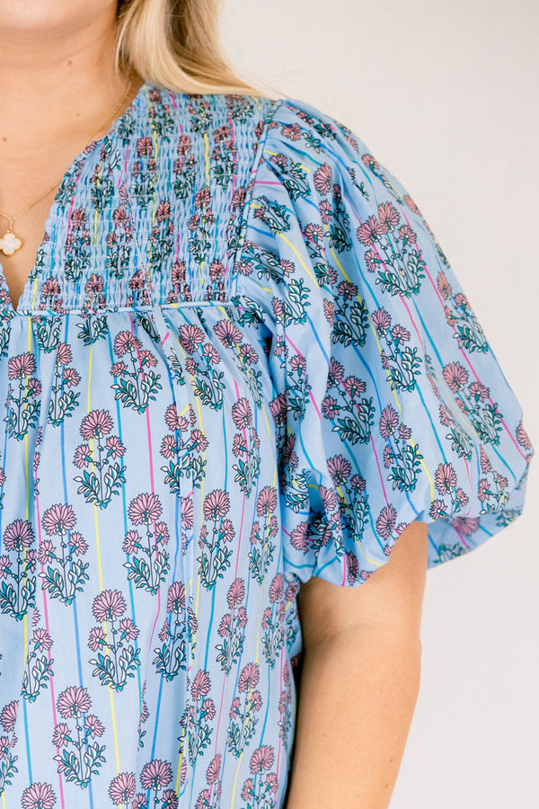 Chic Soul plus size clothing, blue short puff sleeve short dress with green and purple florals and multi colored pin stripe pattern and v-neckline
