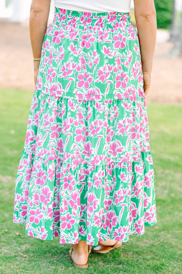 Plus Size tiered maxi skirt in a pink and green floral print with an elastic waistband.