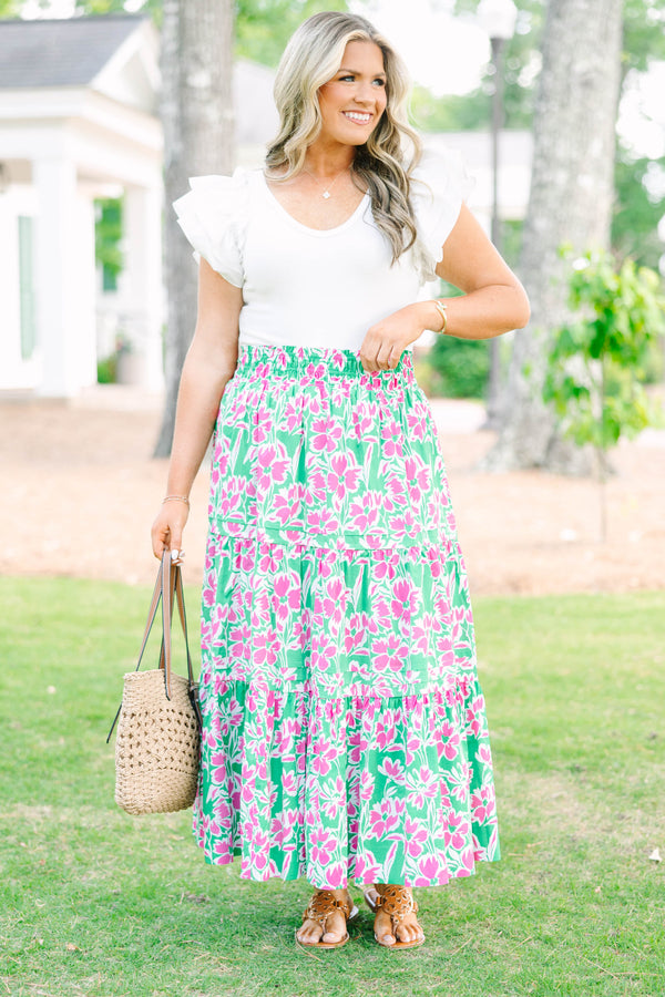 Plus Size tiered maxi skirt in a pink and green floral print with an elastic waistband.