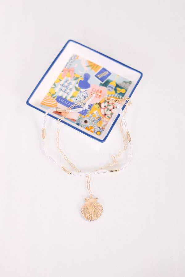 Plus Size gold layered necklace featuring a delicate chain and a shell-shaped pendant.