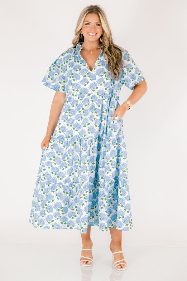 Chic Soul plus size clothing, white tiered maxi dress with short sleeves a slight v-neckline and a blue hydrangea pattern throughout