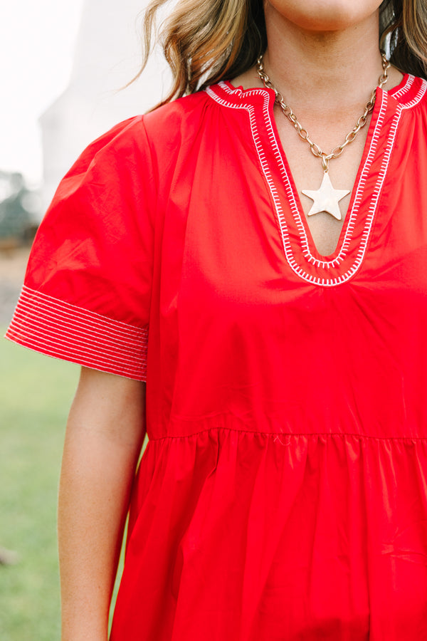 Plus Size red tiered midi dress with short sleeves, a V-neckline, and white embroidered trim.