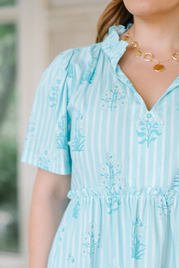 Chic soul plus size clothing, Light blue tiered midi dress with a split v-neck, vertical stripes, and a floral print.