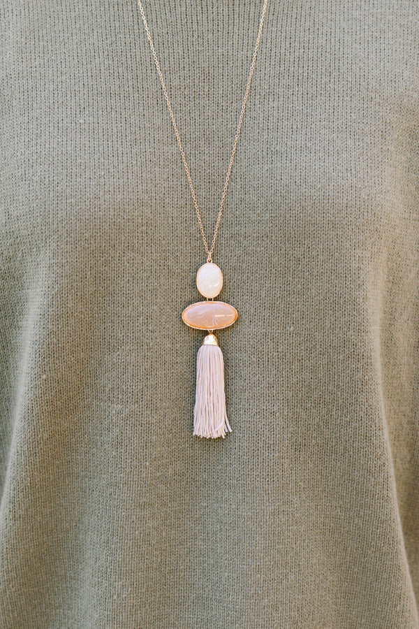 Plus Size long gold chain necklace with white and brown oval stones and a light brown tassel.