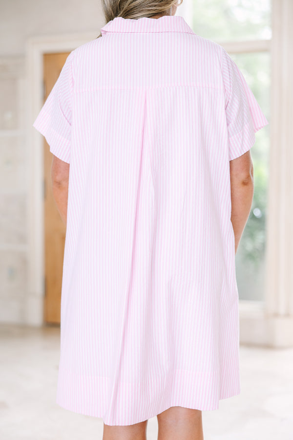Plus size pink and white striped A-line shirt dress with a collared neckline and short sleeves.
