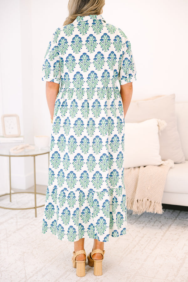 Plus Size green and blue floral block print midi dress with short sleeves and a tiered skirt.