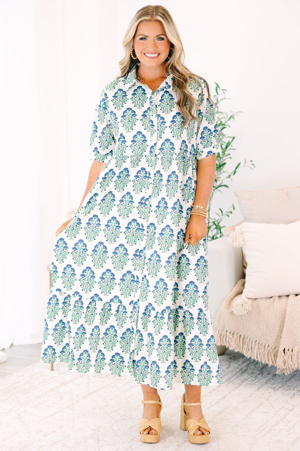 Plus Size green and blue floral block print midi dress with short sleeves and a tiered skirt.