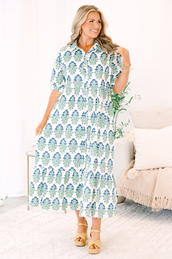 Plus Size green and blue floral block print midi dress with short sleeves and a tiered skirt.
