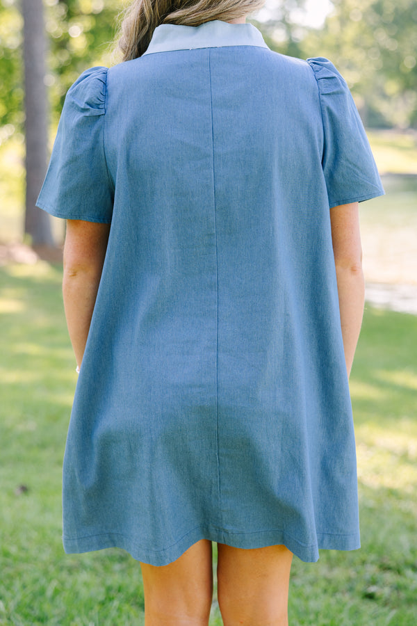 Plus Size denim shift dress with short puff sleeves and a light blue button-down collar.