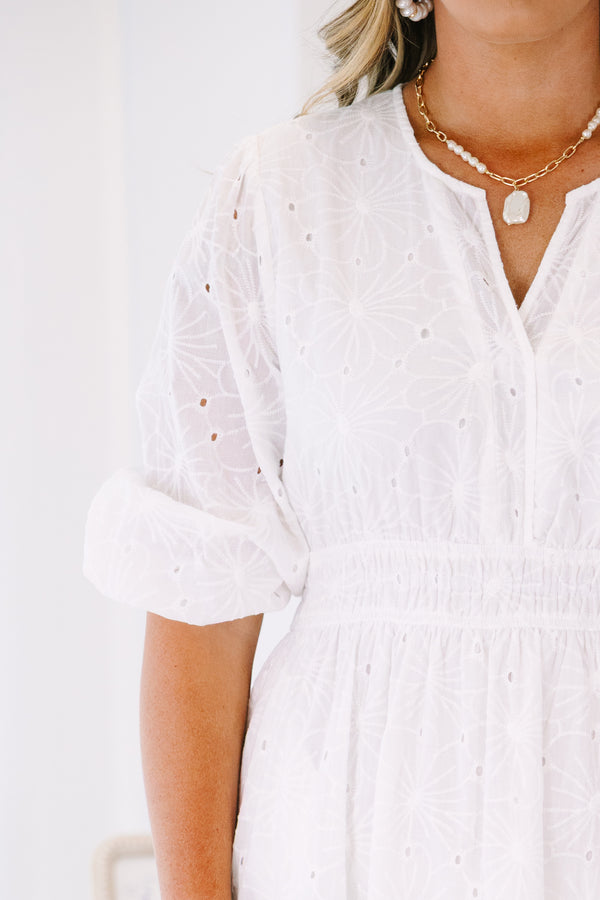 Plus Size white midi dress with eyelet embroidery, a smocked waist, and tiered skirt.