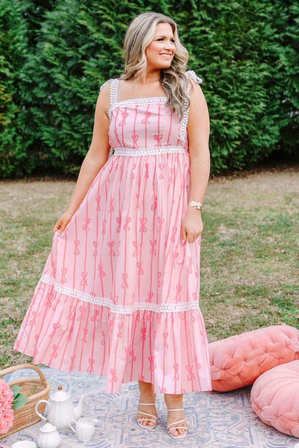 Chic Soul plus size clothing, light pink tiered maxi dress with dark pink bow pattern and white lacy ribbon trim and tie straps