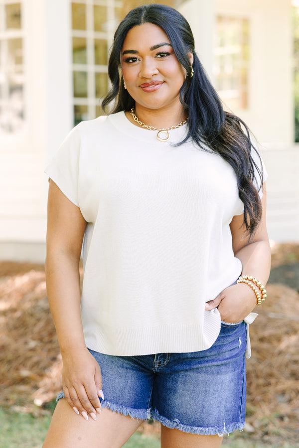 Plus Size oatmeal short sleeve knit sweater with a crew neckline and ribbed hem.