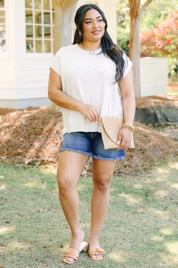 Plus Size oatmeal short sleeve knit sweater with a crew neckline and ribbed hem.
