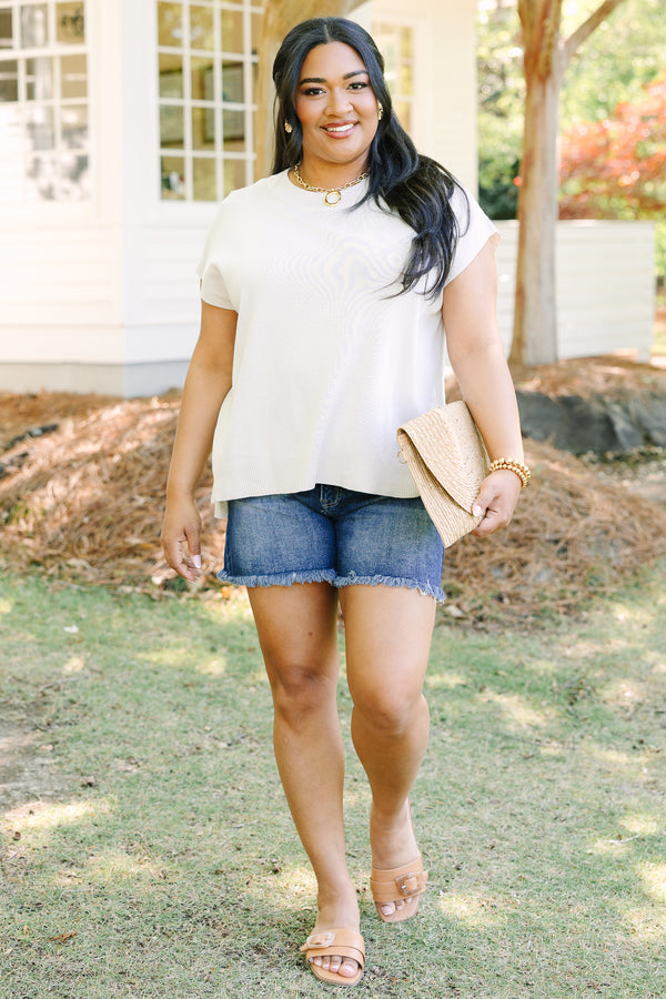 Plus Size oatmeal short sleeve knit sweater with a crew neckline and ribbed hem.